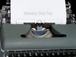 typewriter with statutory sick pay heading