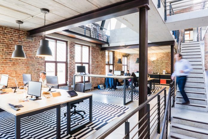 modern looking office with exposed brick walls
