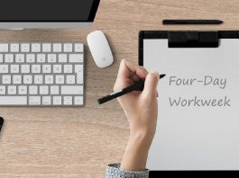 notepad with Four-Day Workweek written on page