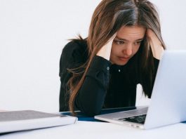 stressed employee at laptop