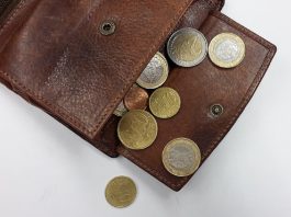 wallet open with coins inside