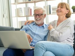 Pensioner viewing laptop