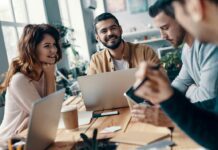 Group of employees in conversation