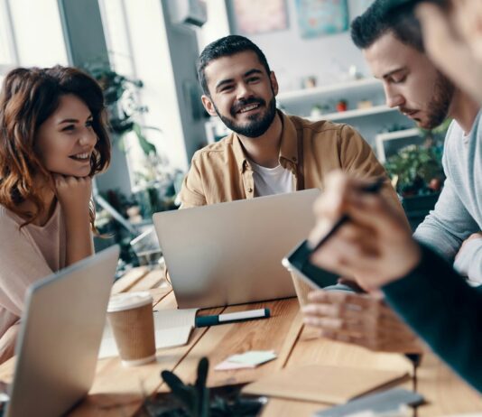 Group of employees in conversation