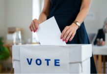 Woman voting in Election Ireland 2024