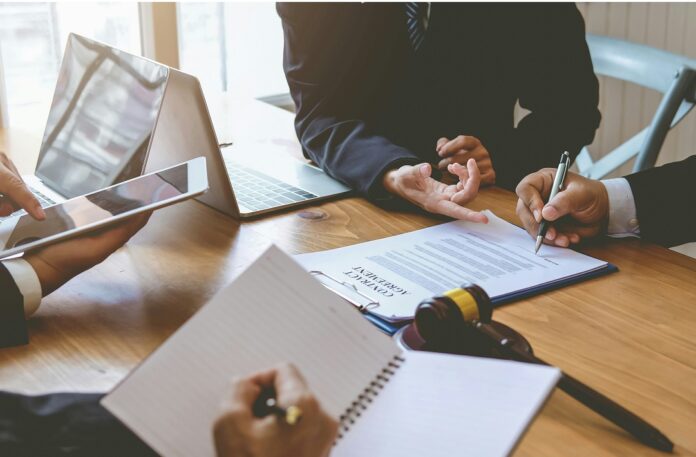 HRHQ Advancing pay equality Legal team discussing advancing pay equality